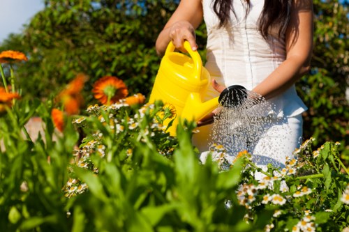 Gardeners wearing protective equipment and receiving training